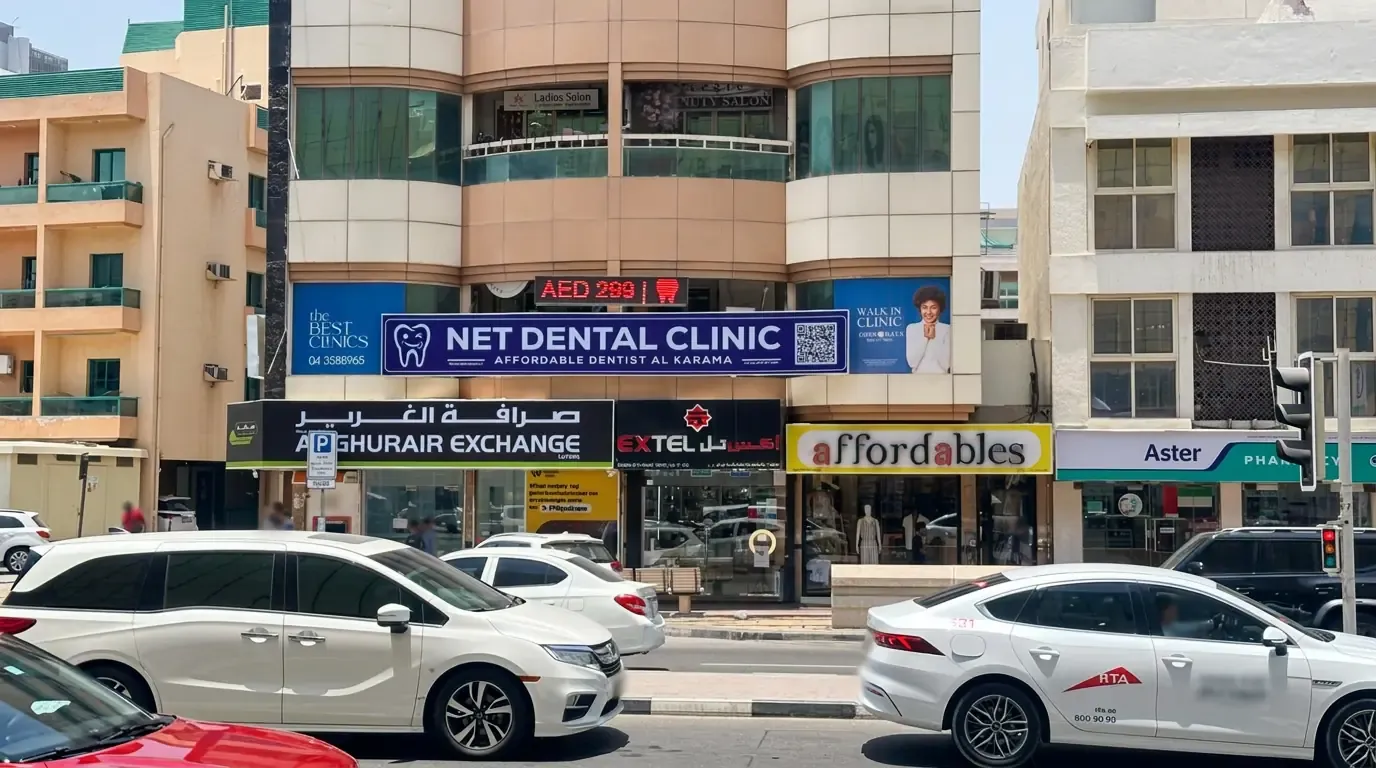 Net Dental Clinic Al Karama exterior and clinic sign on Kuwait Street